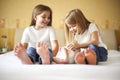 Portrait of the three little sisters, close up. Love and care c Royalty Free Stock Photo