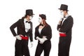 Portrait of three mime artists performing, isolated on white background. Mimes stand thinking. Symbol of finding