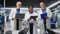 Portrait of three scientists team in biolab conducting a research study Royalty Free Stock Photo