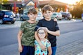 Portrait of three siblings children. Two kids brothers boys and little cute preschool sister girl having fun together Royalty Free Stock Photo