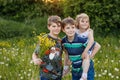 Portrait of three siblings children. Two kids brothers boys and little cute toddler sister girl having fun together on Royalty Free Stock Photo