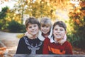 Portrait of three siblings children. Two kids brothers boys and little cute toddler sister girl having fun together in Royalty Free Stock Photo