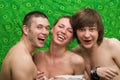 Portrait of three smiling young people Royalty Free Stock Photo