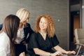 Portrait of three successful business woman collaborating together in office. Royalty Free Stock Photo