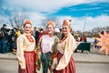 Portrait of three woman in Russian national clothes. Slavic holiday of the end of winter