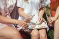 Portrait of three women wearing bathrobe clinking glasses with champagne during brides party Royalty Free Stock Photo