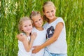 Portrait of three young cousins on willow Royalty Free Stock Photo