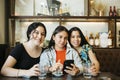 Portrait of three women in a restaurant Royalty Free Stock Photo