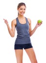 Portrait, thumbs up and woman with smile, apple and nutrition isolated on a white studio background. Person, mockup