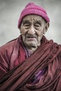 Portrait of an tibetan old monk from Thikse Monastery, Leh. Royalty Free Stock Photo