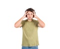 Portrait of tired and annoyed young man, long curly hair style, holding his head with hands, looking exhausted and frustrated. Royalty Free Stock Photo