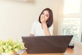 Portrait of tired sleepy businesswoman yawning working at desk i