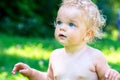 Portrait of a toddler baby girl with blue eyes