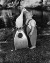 Portrait of toddler with duck