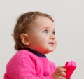 Portrait of Toddler with soft rubber building block