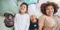 Portrait, top view and parents with children in bed enjoy morning for bonding, quality time and relaxing. Black family Royalty Free Stock Photo