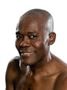 Portrait of topless african smiling man
