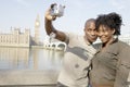 Portrait of tourist couple on Westminster. Royalty Free Stock Photo