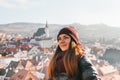 Portrait of a tourist girl who visits the sights in Cesky Krumlov in the Czech Republic.