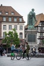 Portrait of tourists on bicycle in Kleber place