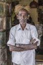 Portrait of a traditional Rajasthani at the door of his home, close to the city of Jaisalmer, India..