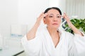 Serene woman enjoying her spa treatments Royalty Free Stock Photo