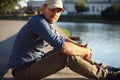 Portrait of trendy young man in the city Royalty Free Stock Photo