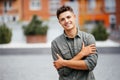 Portrait of a trendy young man in the city street Royalty Free Stock Photo