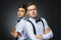 Portrait of two angry boys on gray background. Negative human emotion, facial expression. Closeup