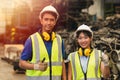 Portrait two Asian young man and women worker thumbs up couple friend team engineer working standing together happy smile to work