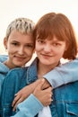 Portrait of two attractive young women with short hair smiling at camera, Young lesbian couple spending time together Royalty Free Stock Photo