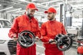 Portrait of a two auto mechanics at the car service Royalty Free Stock Photo