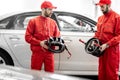 Portrait of a two auto mechanics at the car service Royalty Free Stock Photo