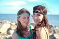 Portrait of two beautiful young hippy women on the beach Royalty Free Stock Photo