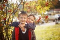 Portrait of two boys, brothers and best friends smiling. Friends hugging. Royalty Free Stock Photo