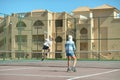 Two boys playing tennis Royalty Free Stock Photo