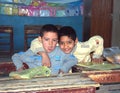 Portrait of two Boys sitting on their disks Royalty Free Stock Photo