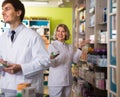 Portrait of two caring pharmacists Royalty Free Stock Photo