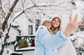 Portrait of two cheerful women friends standing outdoor in the backyard and taking selfie photo Royalty Free Stock Photo