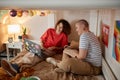 Two Girls Using Laptop Together in College Dorm Royalty Free Stock Photo