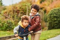 Portrait of two cute little brothers playing together