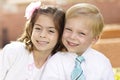 Portrait of two cute little Kids formal dress