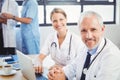 Portrait of two doctors smiling in conference room Royalty Free Stock Photo