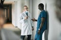 Two Doctors Chatting in Clinic Royalty Free Stock Photo