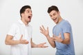 Portrait of two excited young men laughing Royalty Free Stock Photo