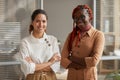 Portrait of Two Female Entrepreneurs in Office Royalty Free Stock Photo