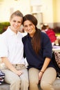 Portrait Of Two Female High School Students Wearing Uniform Royalty Free Stock Photo