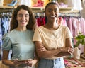 Portrait Of Two Female Owners Or Workers With Digital Tablet In Fashion Clothing Store Royalty Free Stock Photo