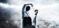 Portrait of two fencers against the backdrop of a sports arena. The concept of fencing. Duel Royalty Free Stock Photo