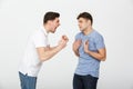 Portrait of two frustrated young men having an argument Royalty Free Stock Photo